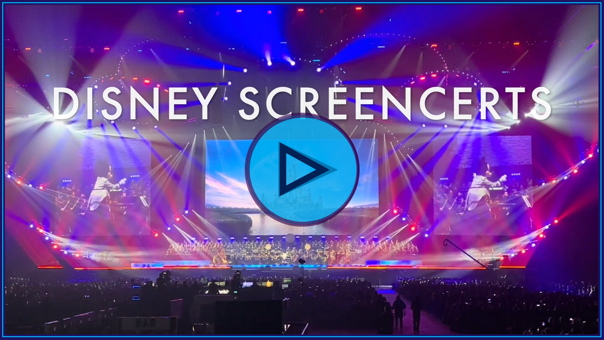 A large stage with a large screen with a castle on it  Description automatically generated